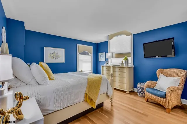 a kitchen with stainless steel appliances a sink and cabinets
