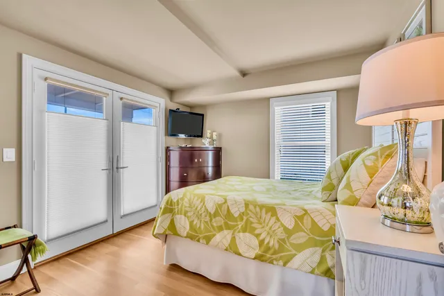 a view of a chairs and table in the balcony