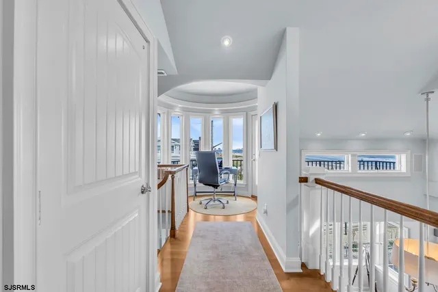 a bathroom with double sink and a mirror