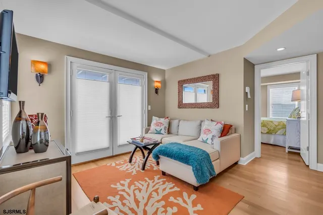 a bathroom with a sink mirror vanity and toilet