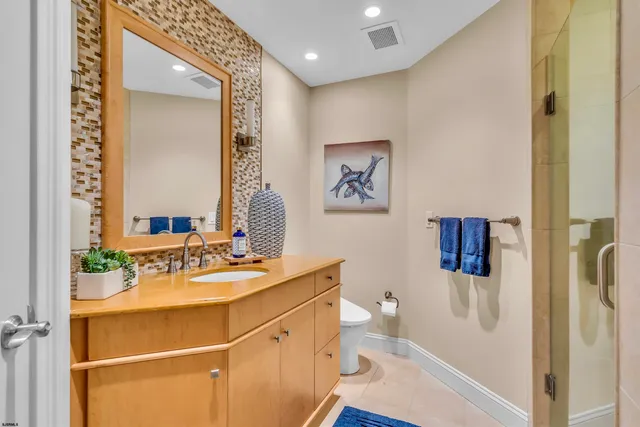 a living room with lots of furniture and a flat screen tv