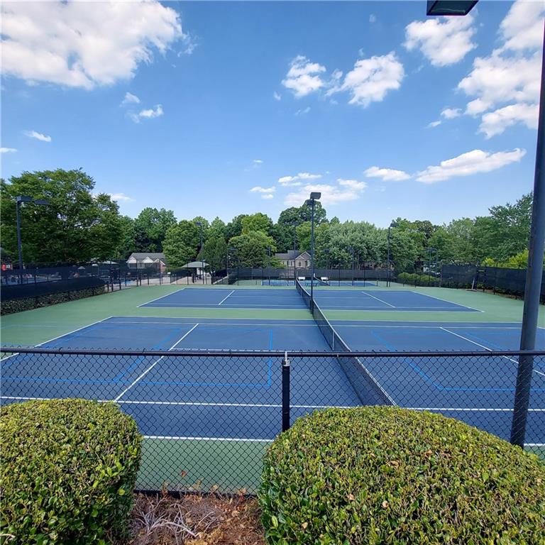 3195 Stonecrest Drive Cumming, GA 30041 - Photo 10 of 63 a view of a tennis court