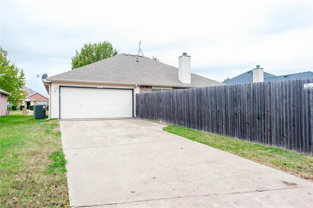 a front view of house with pathway