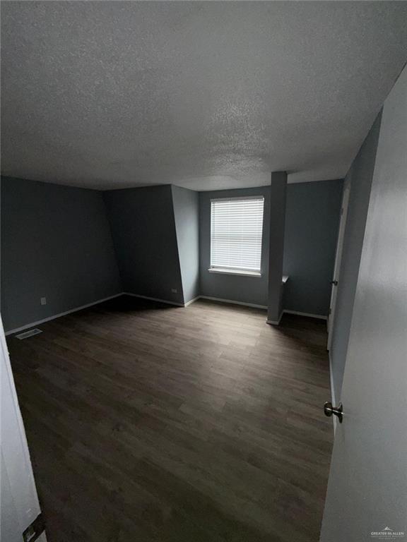10850 Shiloh Road Dallas, TX 75228 - Photo 6 of 10 an empty room with a empty space