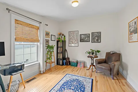 a room with furniture and a window