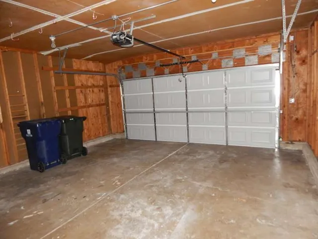 a view of a room with wooden walls