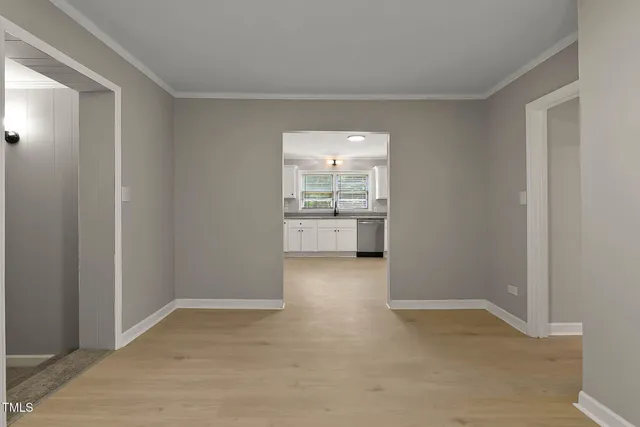 a view of a kitchen and a window