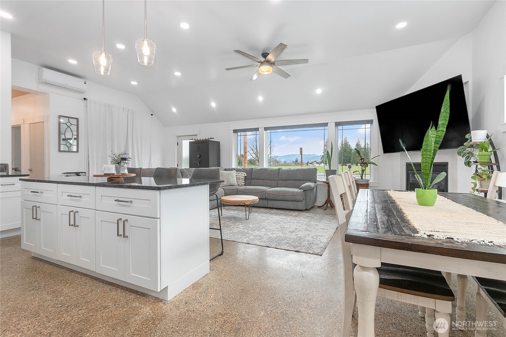 7393 Hannegan Road Lynden, WA 98264 - Photo 13 of 29 a large kitchen with kitchen island granite countertop lots of counter top space and stainless steel appliances