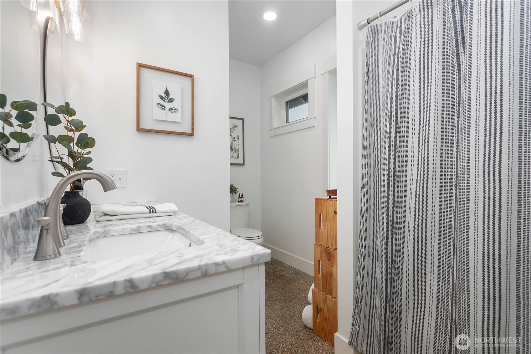 7393 Hannegan Road Lynden, WA 98264 - Photo 14 of 29 a bathroom with a sink and a mirror