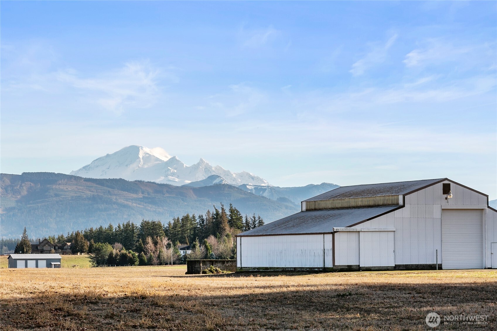 7393 Hannegan Road Lynden, WA 98264 - Photo 29 of 29 a view of a house with a yard