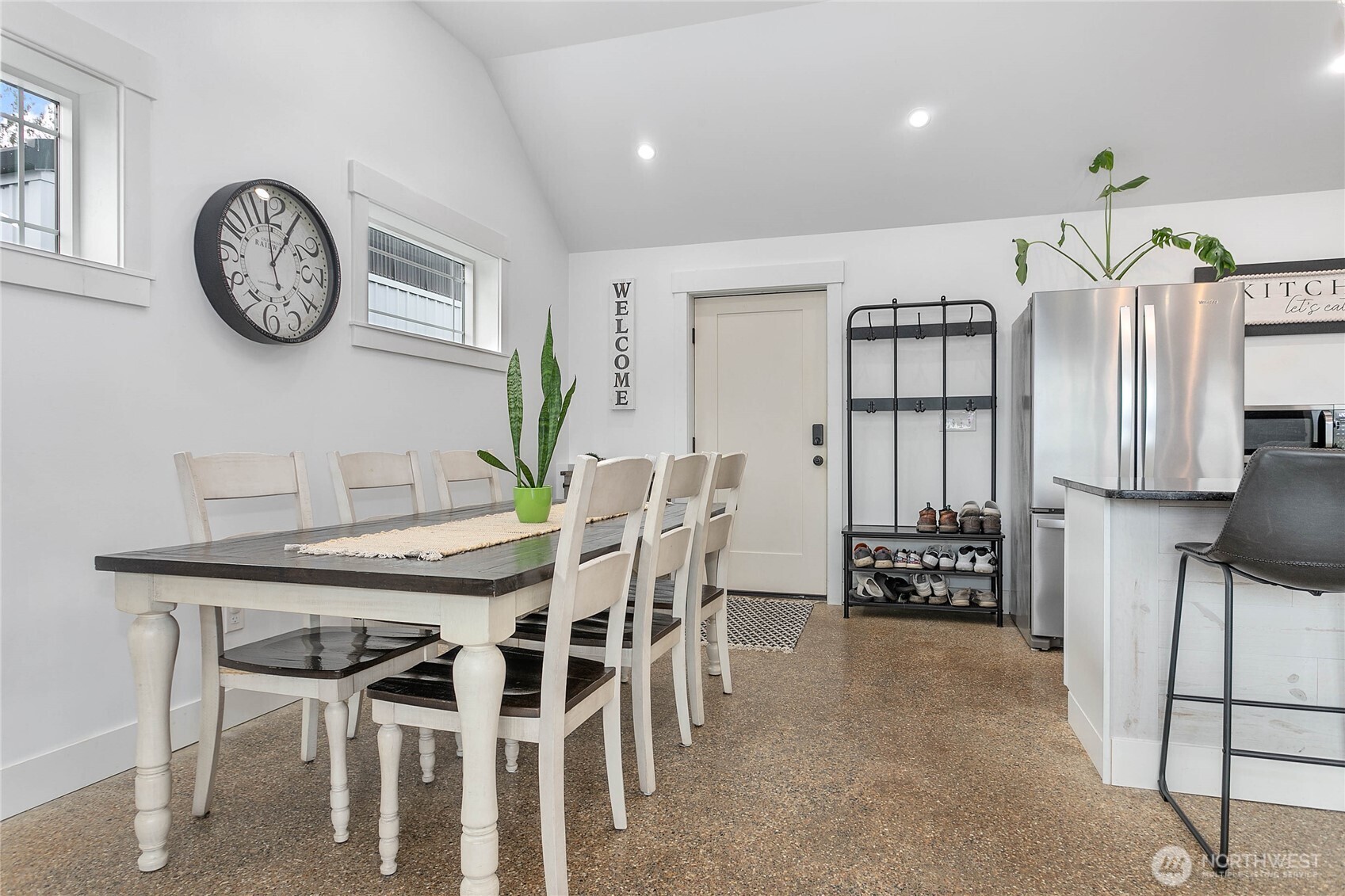 7393 Hannegan Road Lynden, WA 98264 - Photo 8 of 29 a view of a dining room with furniture and a large window