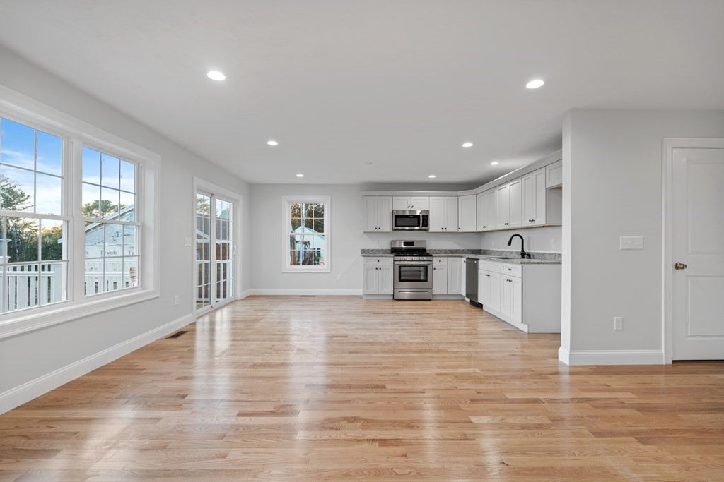 108 High Street, Unit B Wareham, MA 02571 - Photo 8 of 31 a view of kitchen with wooden floor