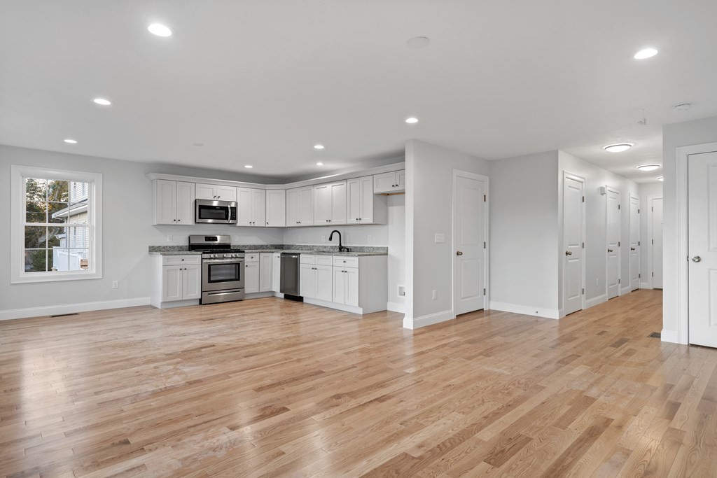 108 High Street, Unit B Wareham, MA 02571 - Photo 9 of 31 a view of kitchen with wooden floor