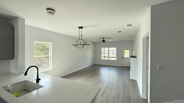 a view of a room that has a bathtub in it