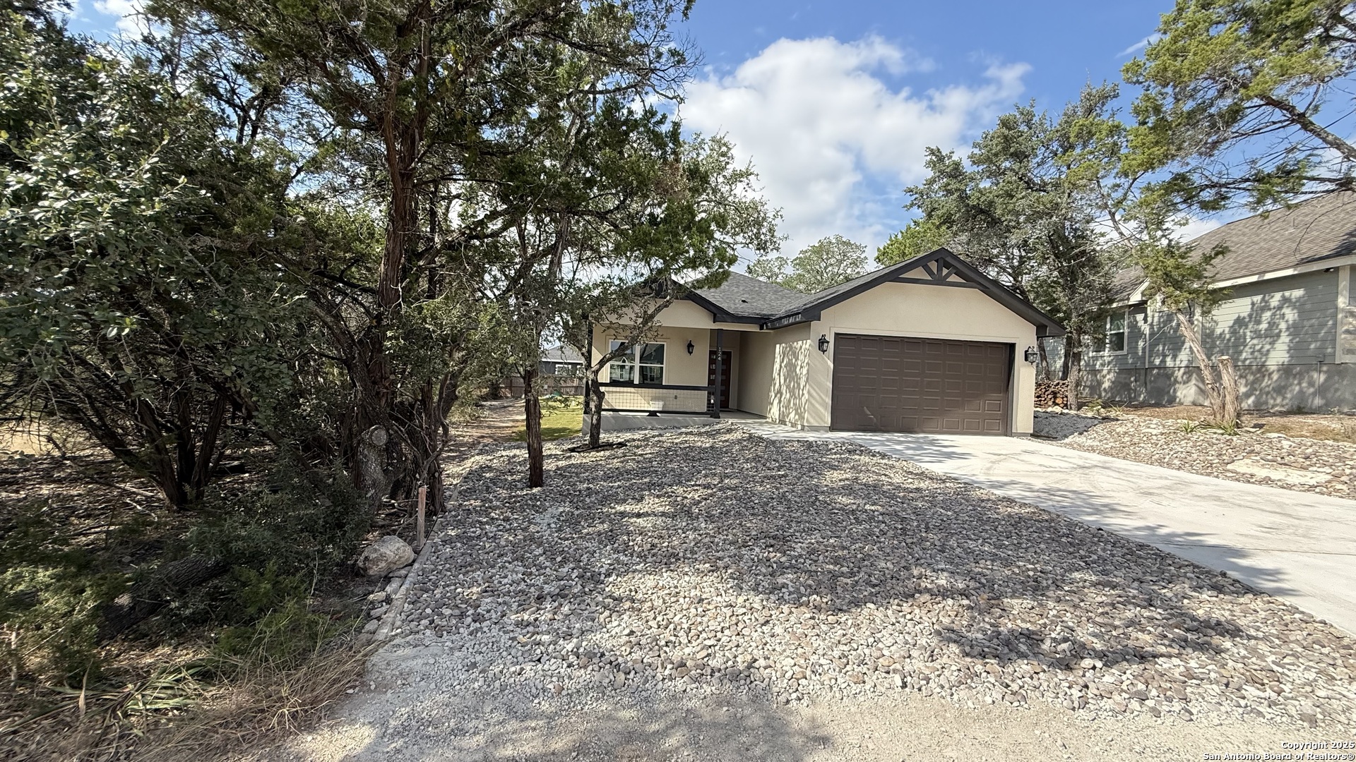 124 Lookout Court Spring Branch, TX 78070 - Photo 2 of 28 a view of a house with a yard