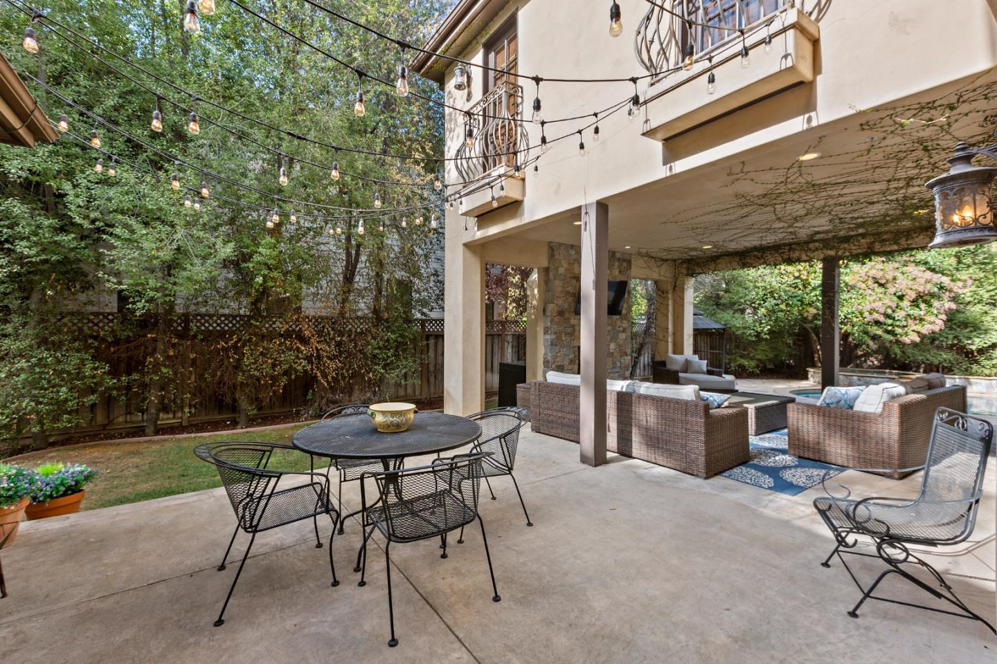 1187 Clark Way San Jose, CA 95125 - Photo 20 of 81 a patio with a table and chairs and potted plants