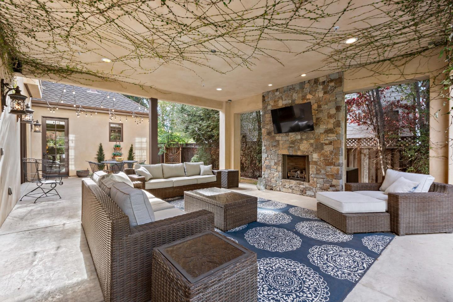 1187 Clark Way San Jose, CA 95125 - Photo 25 of 81 a living room with furniture a large window and a fireplace