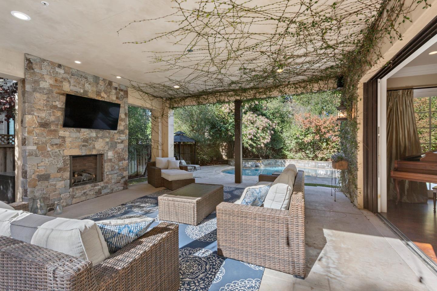 1187 Clark Way San Jose, CA 95125 - Photo 29 of 81 a outdoor living space with patio furniture and a fireplace