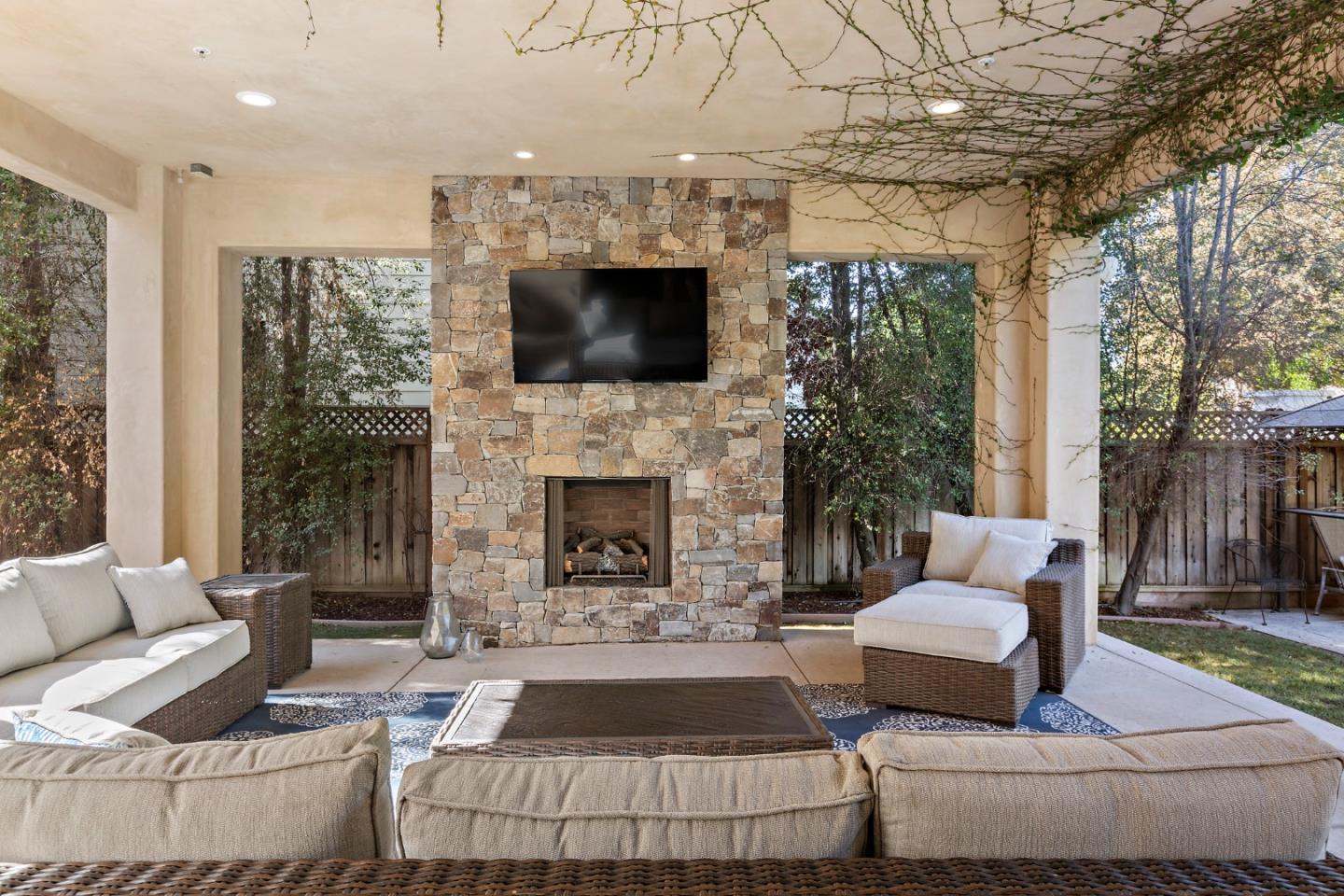 1187 Clark Way San Jose, CA 95125 - Photo 30 of 81 a living room with furniture a flat screen tv and a fireplace