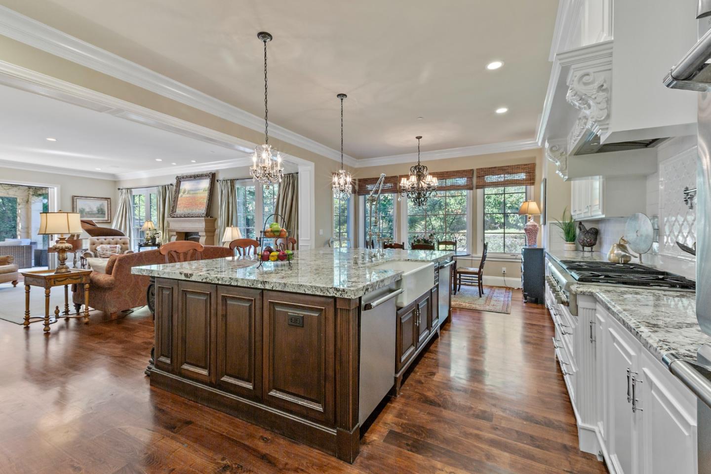 1187 Clark Way San Jose, CA 95125 - Photo 38 of 81 a kitchen with stainless steel appliances granite countertop a stove and a wooden floors