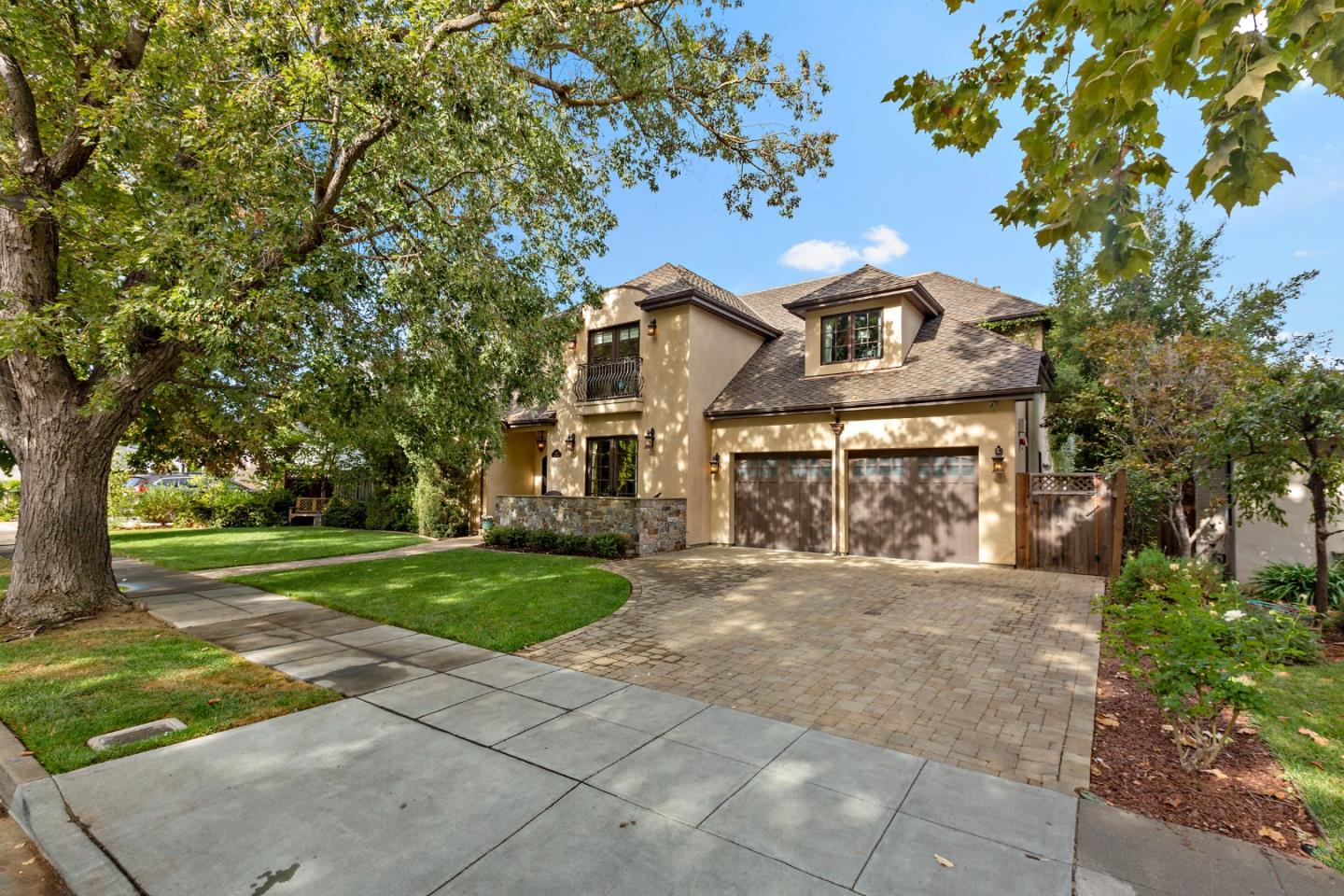 1187 Clark Way San Jose, CA 95125 - Photo 4 of 81 a front view of a house with a yard and garage