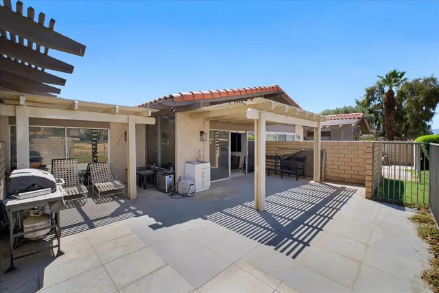 a view of a house with wooden floor and furniture