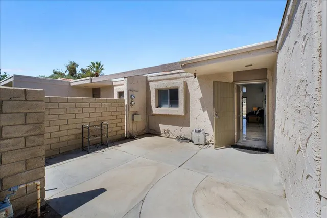 a view of a terrace with chairs