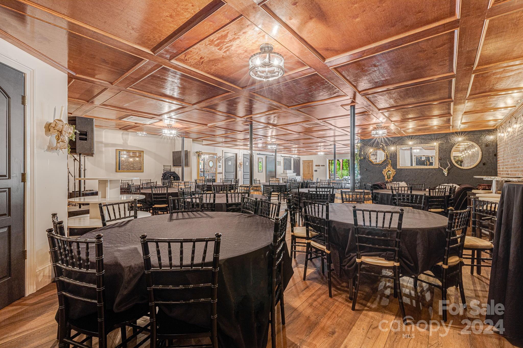 116 Holcombe Cove Road Candler, NC 28715 - Photo 12 of 31 a view of a dining room with furniture