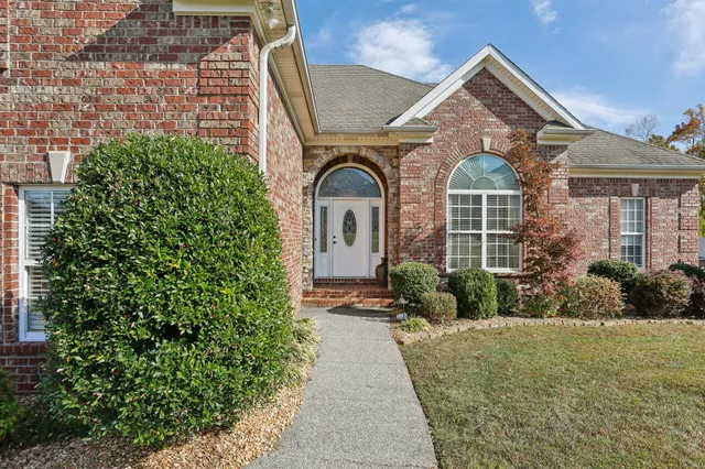 a view of living room kitchen and a window