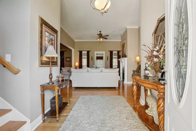a view of a entryway with wooden floor