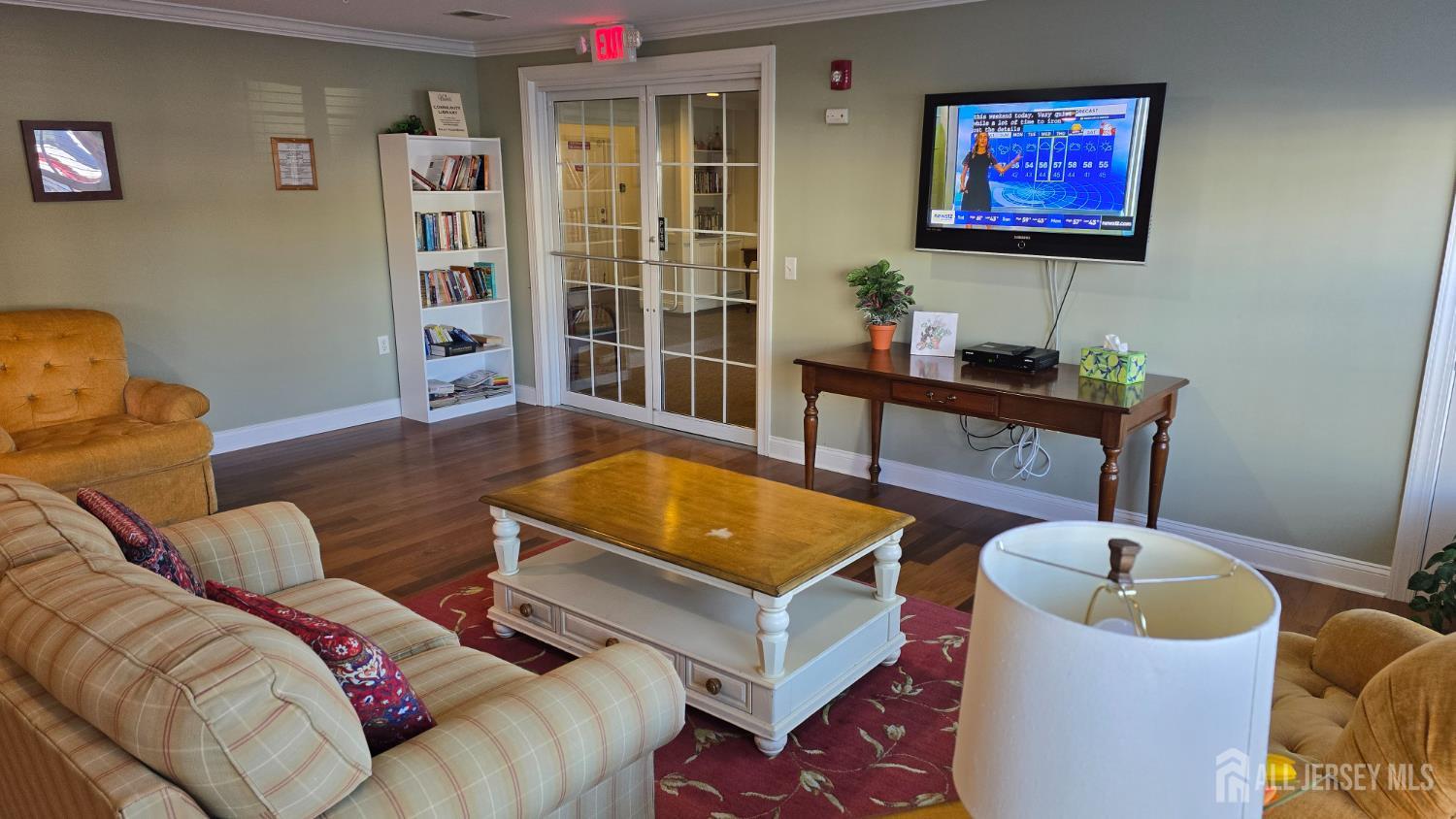 205 Liddle Avenue Edison, NJ 08837 - Photo 19 of 32 a living room with furniture a rug and a window