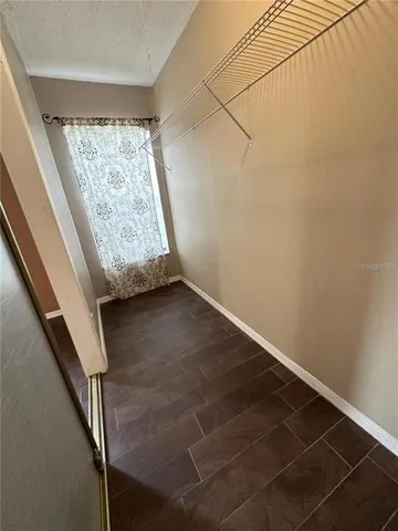 a view of entry way with wooden floor