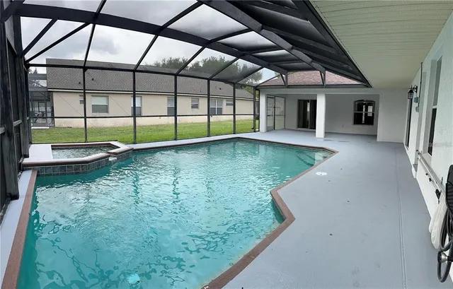 a view of a backyard of a house