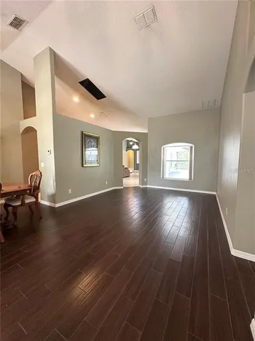 a view of workspace with wooden floor