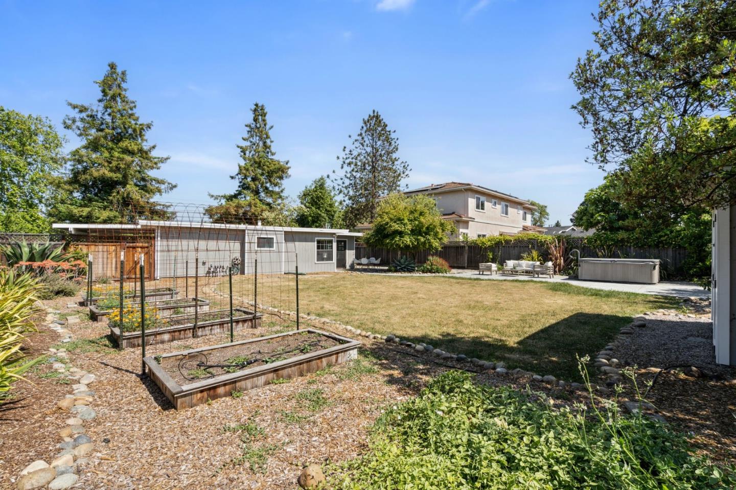 1363 Ramon Drive Sunnyvale, CA 94087 - Photo 27 of 36 a view of a garden with a bench