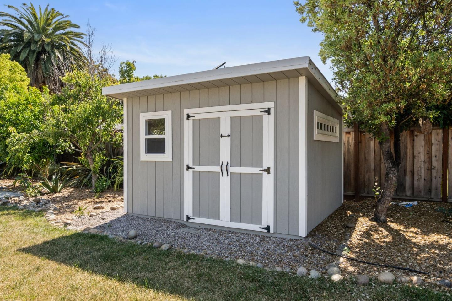 1363 Ramon Drive Sunnyvale, CA 94087 - Photo 28 of 36 a view of a house with backyard and trees