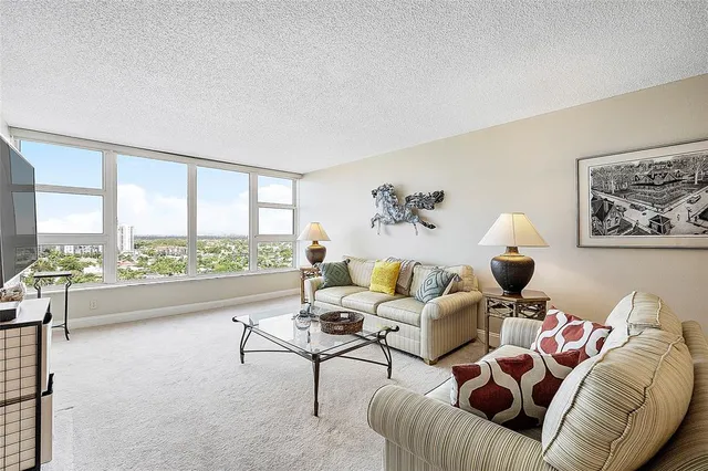 a view of a hallway with windows