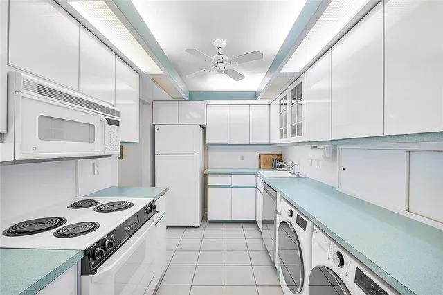 a room with a bed window and a couch