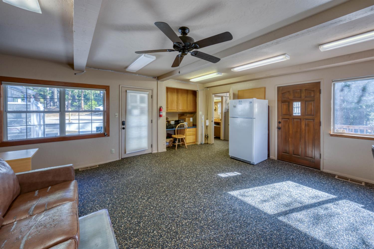 41593 Tollhouse Road Shaver Lake, CA 93664 - Photo 21 of 55 a view of an empty room with a window