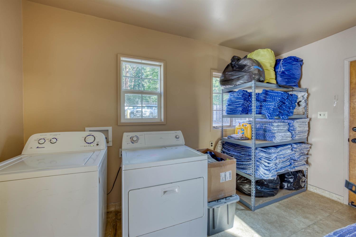 41593 Tollhouse Road Shaver Lake, CA 93664 - Photo 27 of 55 a room with storage and utility