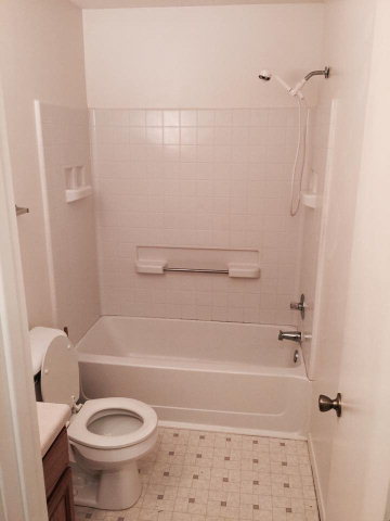 133 Stirk Road Macon, GA 31211 - Photo 13 of 16 a bathroom with a toilet and a shower