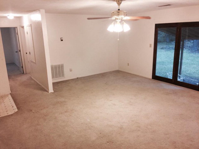 133 Stirk Road Macon, GA 31211 - Photo 4 of 16 an empty room with chandelier fan