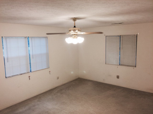 133 Stirk Road Macon, GA 31211 - Photo 7 of 16 wooden floor in an empty room with a window
