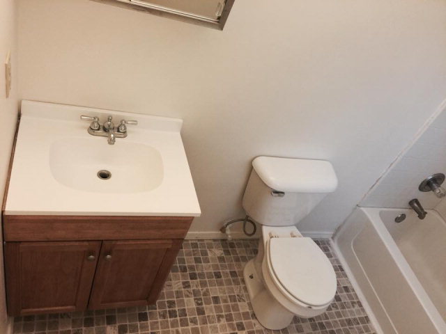133 Stirk Road Macon, GA 31211 - Photo 8 of 16 a bathroom with a sink mirror vanity and toilet