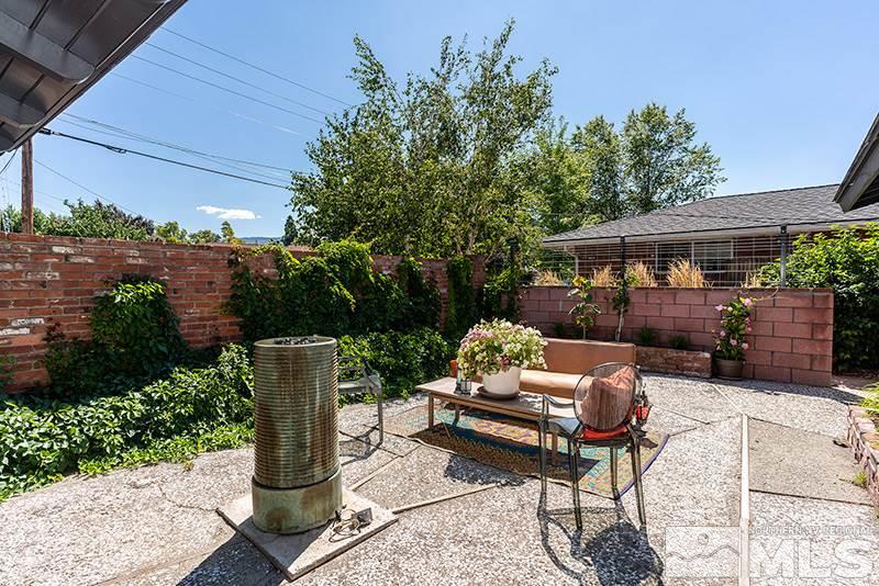 1335 Monroe Street Reno, NV 89509 - Photo 23 of 25 a view of a patio with couches chairs and a table and chairs