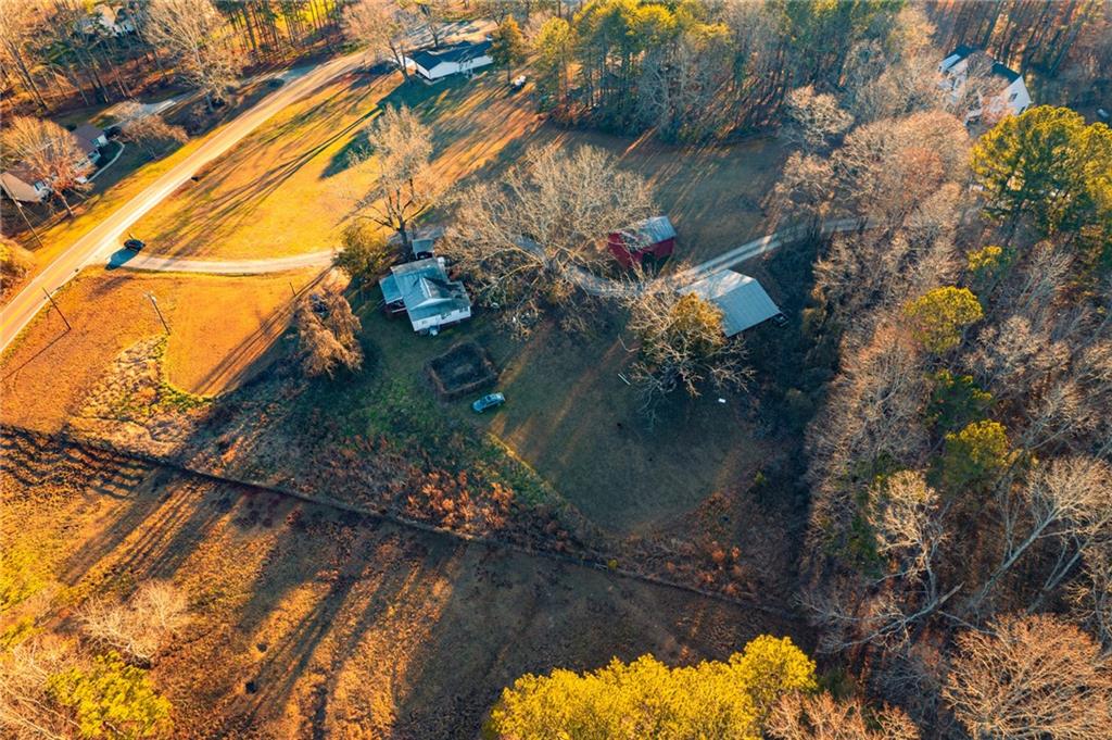 873 Long Road Ball Ground, GA 30107 - Photo 6 of 18 a backyard of a house
