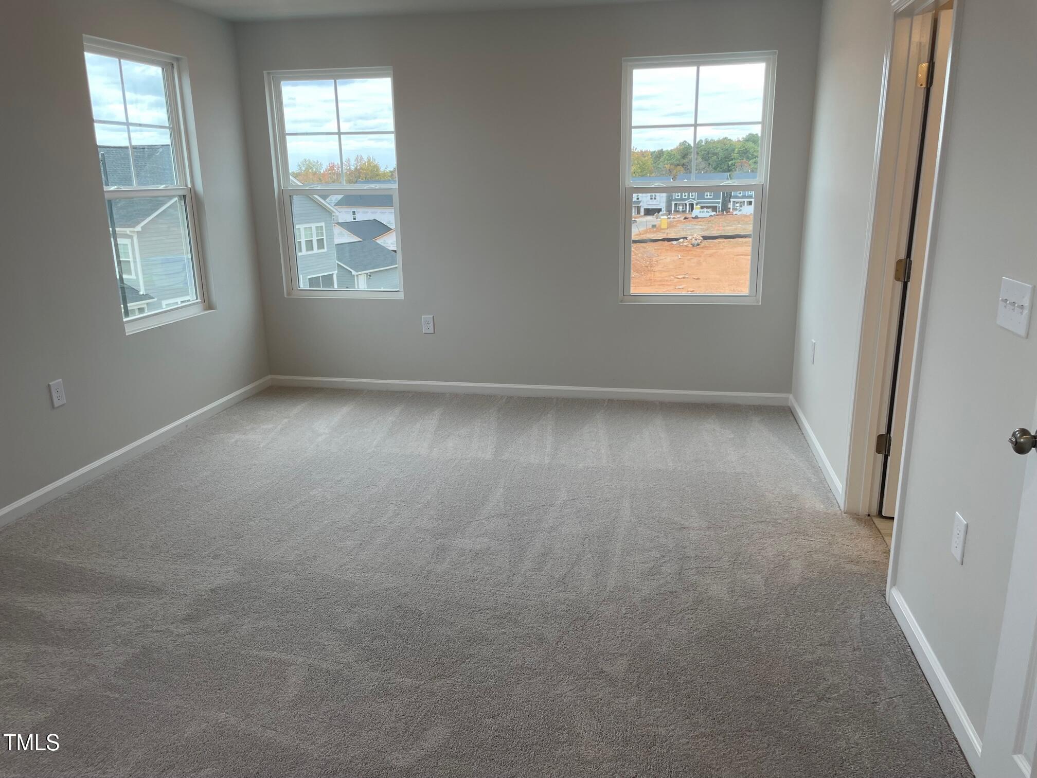 364 Devon Clfs Drive Wake Forest, NC 27587 - Photo 11 of 30 an empty room with windows