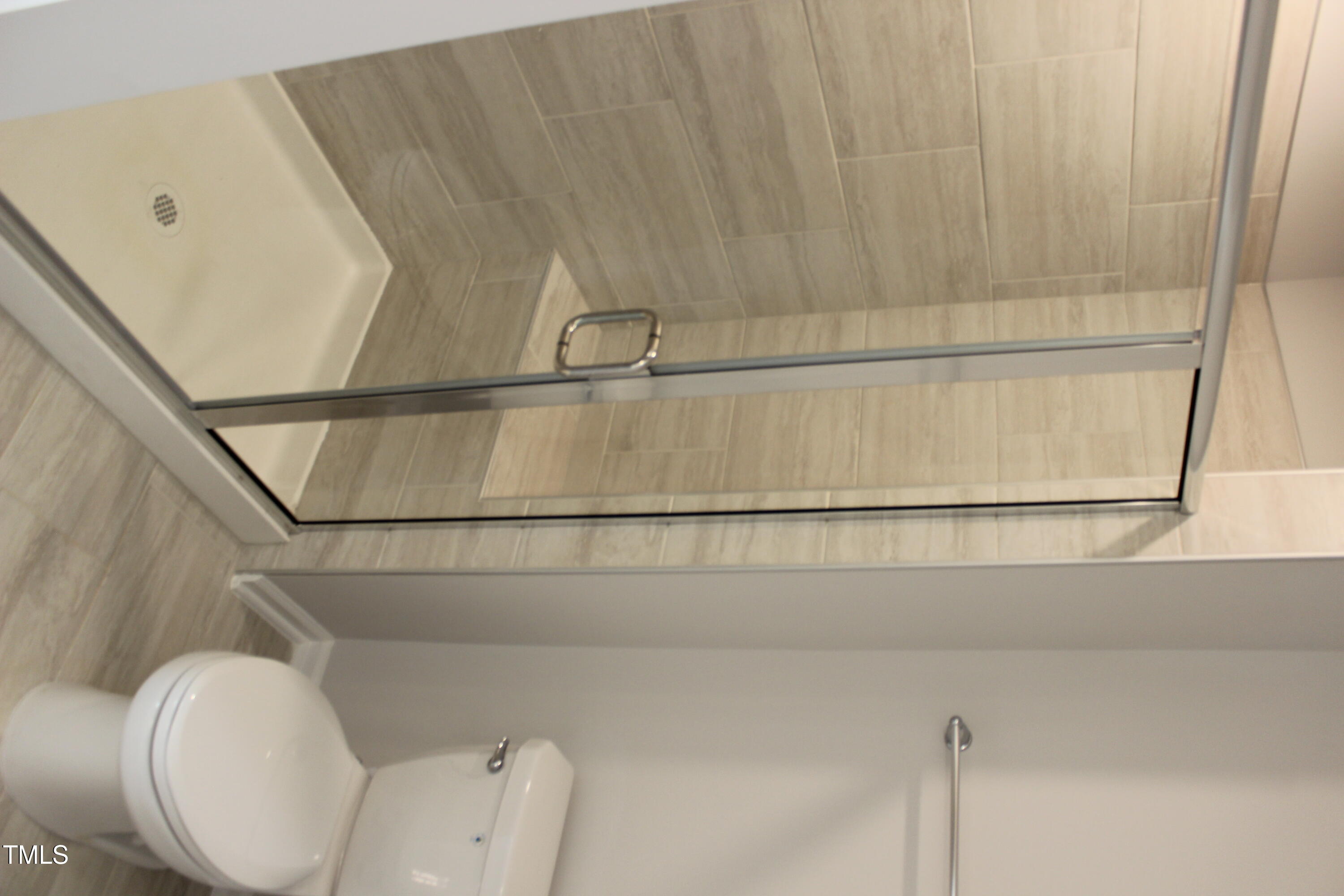 364 Devon Clfs Drive Wake Forest, NC 27587 - Photo 13 of 30 a bathroom with a toilet and a shower