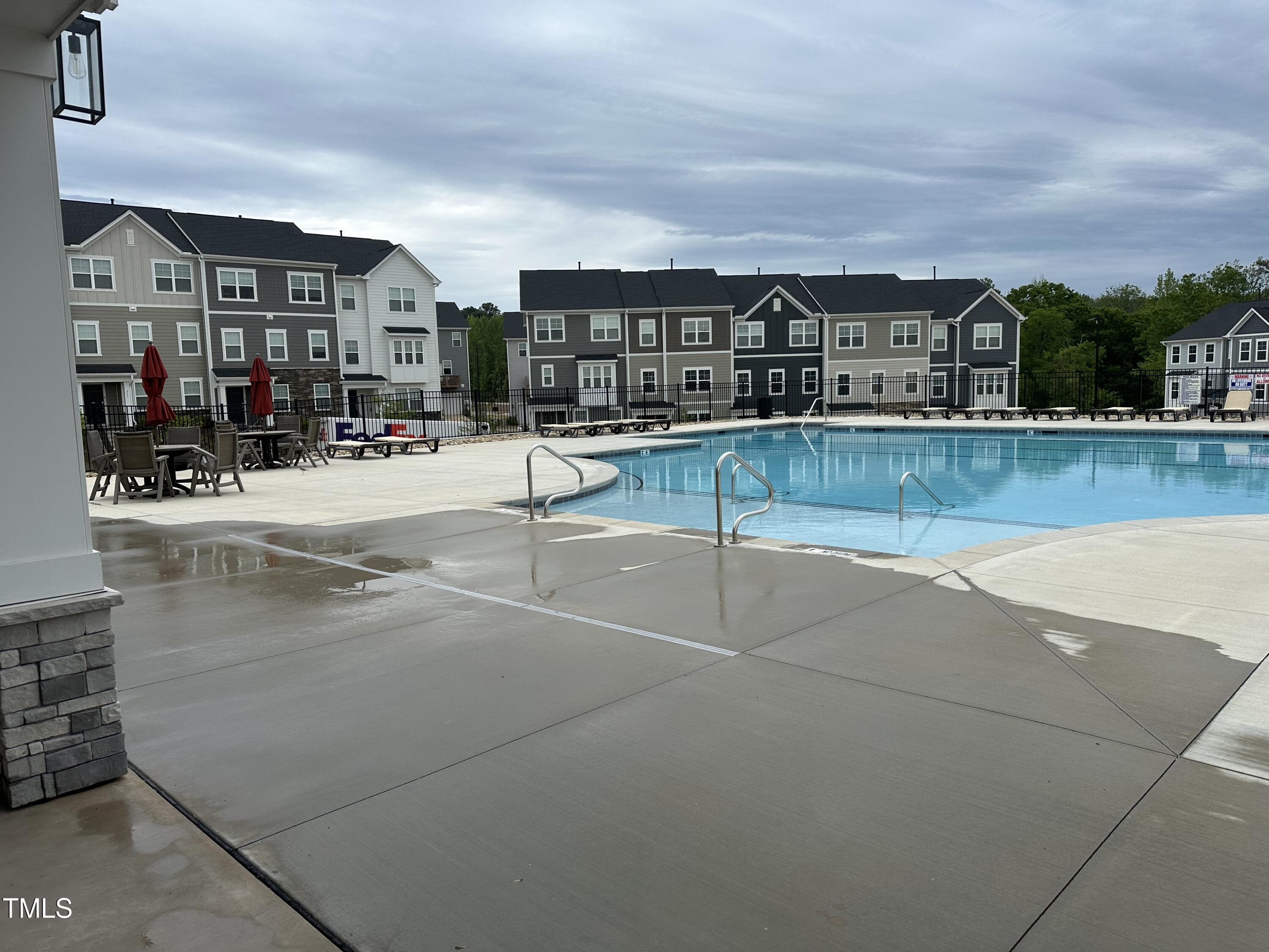 364 Devon Clfs Drive Wake Forest, NC 27587 - Photo 28 of 30 a view of a terrace with a garden