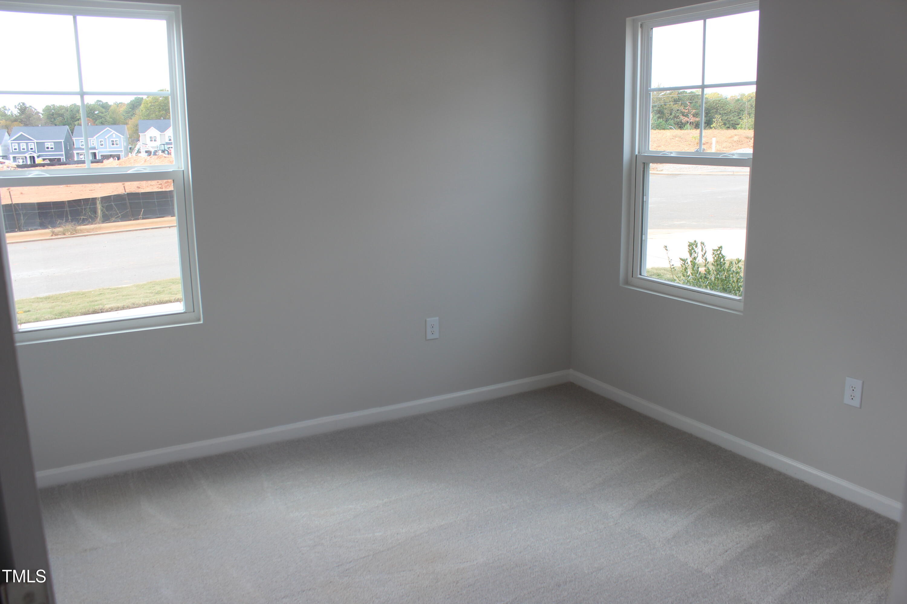 364 Devon Clfs Drive Wake Forest, NC 27587 - Photo 9 of 30 an empty room with a window